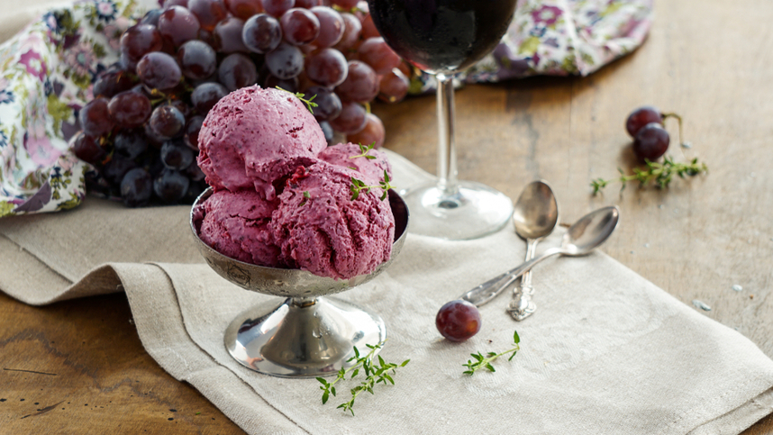 A fruit ice cream and a wine