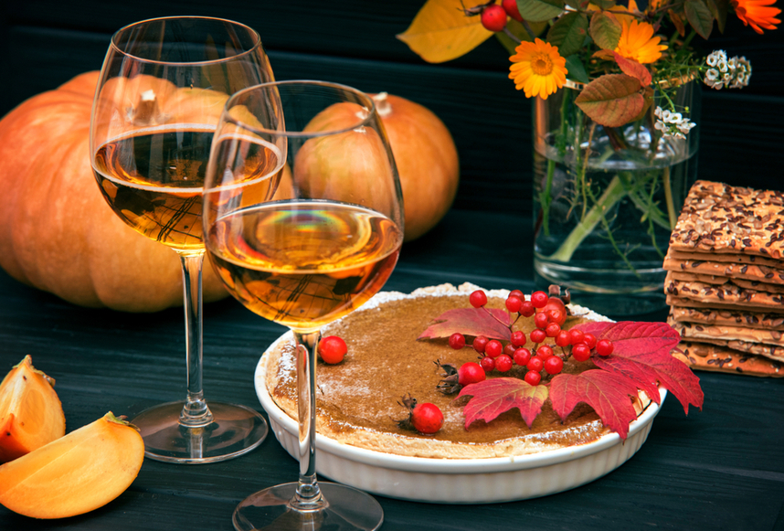 A pumpkin dessert and a sweet glass of wine